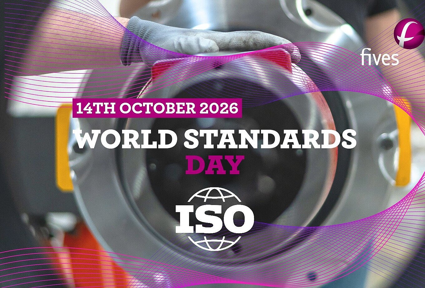 Technician handling industrial equipment for World Standards Day 2026, featuring the ISO logo and international standards message.